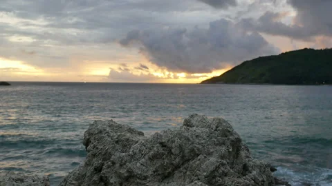 Rock look like table, put your product on the rock, sea wave hit shore, cloud Stock Footage 133986659