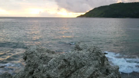 Rock look like table, put your product on the rock, sea wave hit shore, cloud Stock Footage 133986731