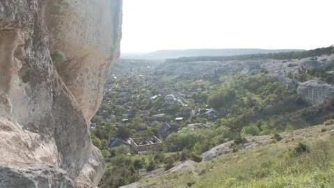  rock mass in the background of the city Stock Footage 167053813