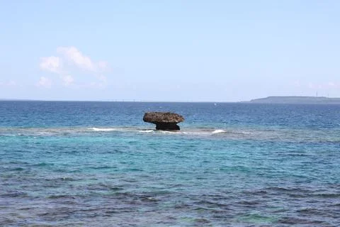 Rock in the Middle of the Ocean Stock Photos