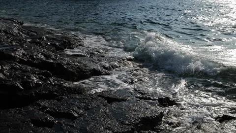 Rock in the middle of the sea Stock Footage 249479229
