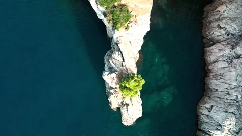 Rock in the middle of the sea Stock Footage 249557593