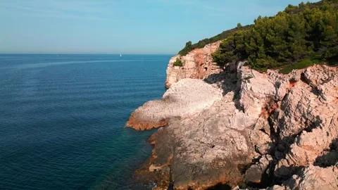 Rock in the middle of the sea Stock Footage 249558461
