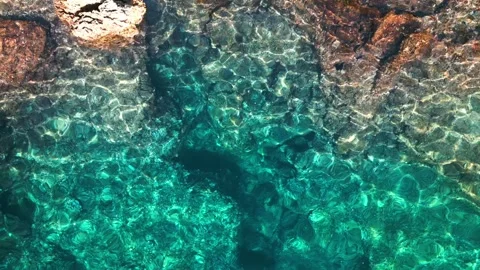 Rock in the middle of the sea Stock Footage 249622337