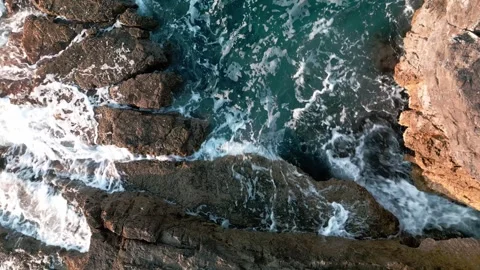 Rock in the middle of the sea Stock Footage 249690139