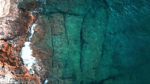 Rock in the middle of the sea Stock Footage 249690619