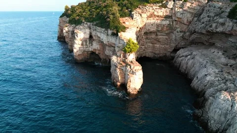 Rock in the middle of the sea Stock Footage 249695444