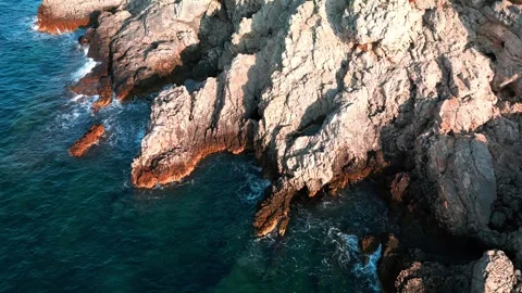 Rock in the middle of the sea Stock Footage 249696193