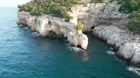 Rock in the middle of the sea Stock Footage 249696443