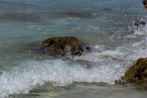 Rock in the middle of the sea2 Stock Photos