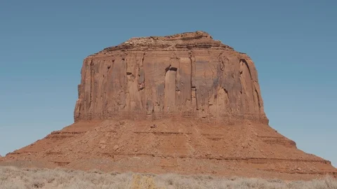 Rock Monolith Butte Of Orange Red Color In Desert Of Monument Valley Usa Stock Footage 127054828