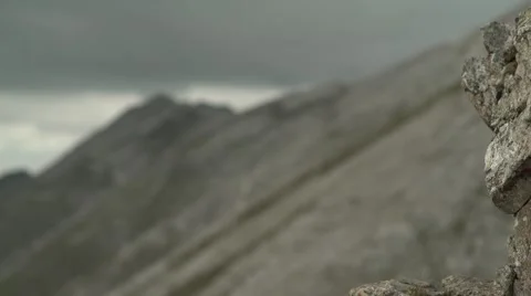 Rock to Mountain Range Focus 4K Stock Footage 67478147