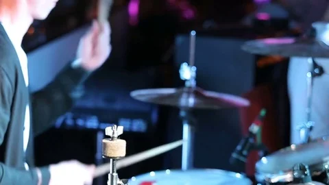 Rock n roll drummer plays music on concert Video stock 80078094