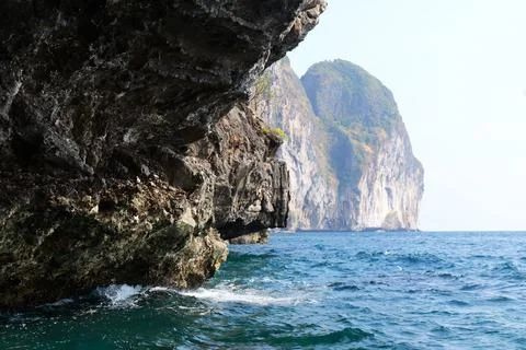Rock in the ocean, stone structure Fotos Stock