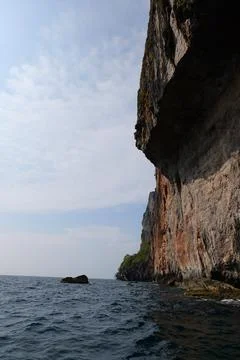 Rock in the ocean, stone structure Fotos Stock