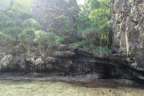 Rock in the ocean, stone structure Photos