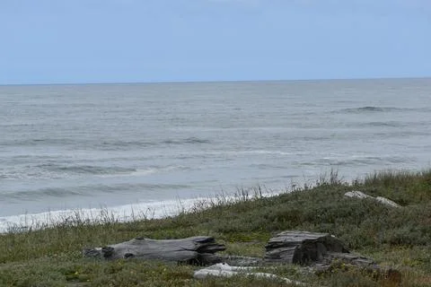 Rock in the Ocean waves Stock Photos