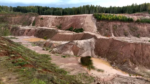 Rock in Old quarry after mining. Abandoned Opencast mine. Video stock 219784176