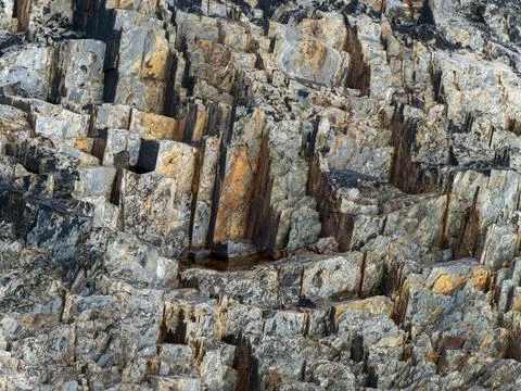 Rock pattern. Stone background, natural rock formation. Layered rock Stockfoto's