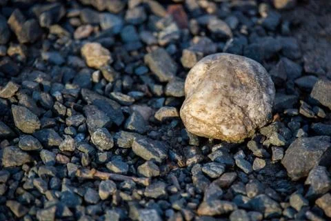 Rock on pebbles Stock Photos