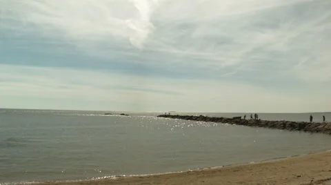 Rock peninsula on shoreline Stock Footage 49934368