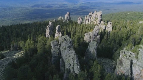 Rock pillars standing in a circle. Ural mountains. Video stock 116270594