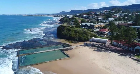 Rock pool at Austinmer Beach Overview Drone footage Video stock 115709573