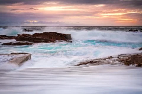 Rock Pool overflows in large swells Photos