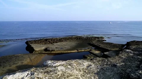 Rock by the sea Stock Footage 167584490