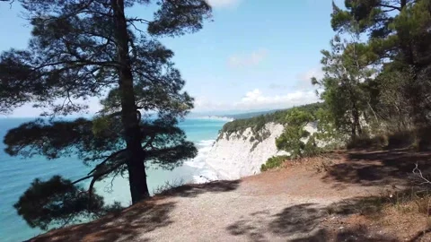 Rock sea summer rocks waves blue abyss Stock Footage 149183905