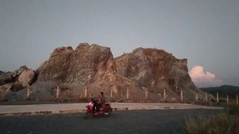 A rock shaped like a human face Stock Footage 238051643