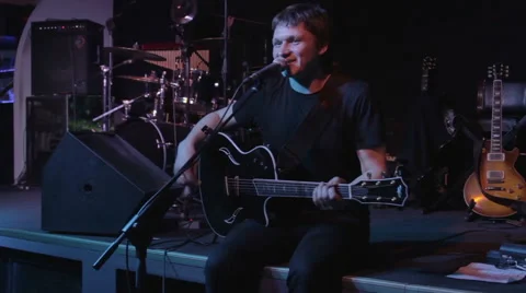 Rock singer on stage Stock Footage 47283226