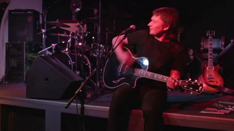 Rock singer on stage Stock Footage 47284344