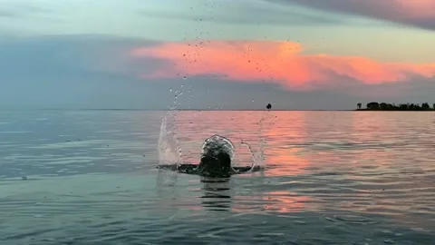 Rock Skipping in Slow Motion Stock Footage 142101536