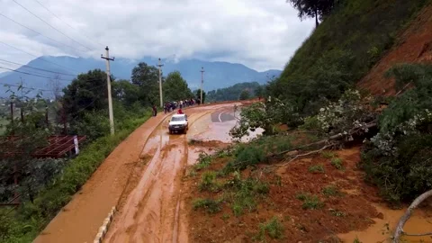 Rock slide with damage on the road during Landslide (Top view) Stock-Footage 310954749