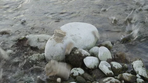 Rock smashing on another Stock Footage 314858593
