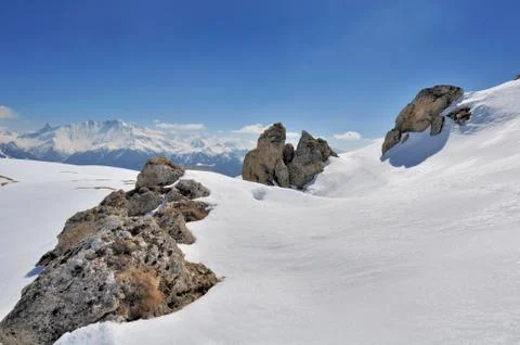 Rock in the snow Stock Photos