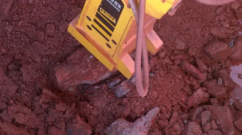 Rock splitter  head hammering rocks Stock Footage 55043273