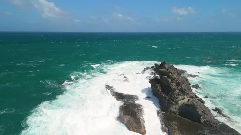 Rock spur and white water on the Atlantic shore Stock Footage 346107589