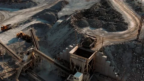 Rock stone crushing machine at a mining quarry. Quarry with minerals extraction. Stock-Footage 158476365