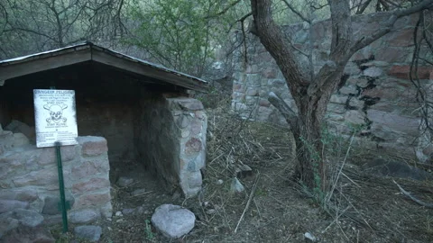Rock structures and warning sign at an old mining site Stock Footage 260320837