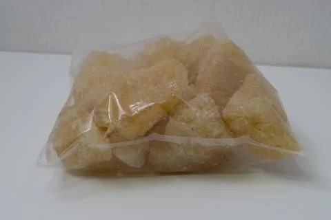 Rock sugar, in the form of irregular lumps and in smoother Stock Photos