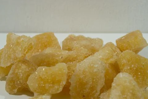 Rock sugar, in the form of irregular lumps and in smoother Stock Photos
