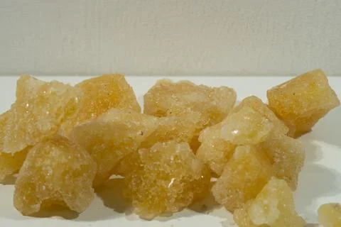 Rock sugar, in the form of irregular lumps and in smoother Stock Photos
