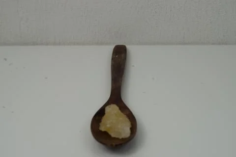 Rock sugar, in the form of irregular lumps and in smoother Stock Photos