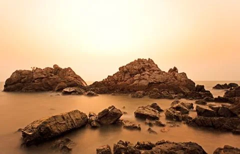 Rock in sunset light Stock Photos