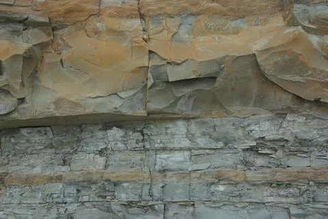 Rock surface background texture weathering the ravages of time Stock Photos