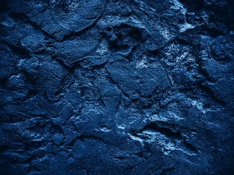 Rock surface with cracks. Abstract texture. Rock texture. Dark stone wall. St Stock Photos