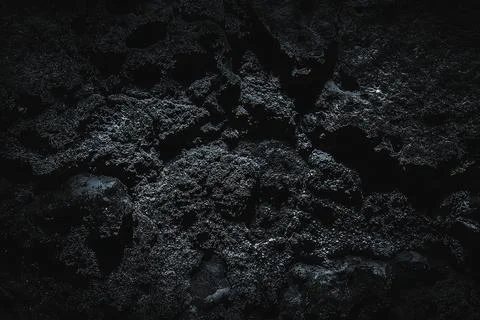 Rock surface with cracks. Black texture. Stone background. Dark marble. Rock  Stock Photos