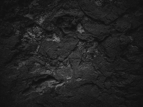 Rock surface with cracks. Black texture. Stone background. Dark marble. Rock  Stock Photos
